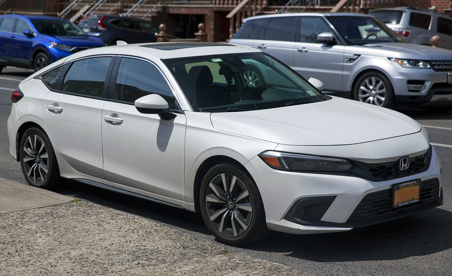 A current-generation Honda Civic hatchback, the small car this living-and-sleeping gear guide covers.