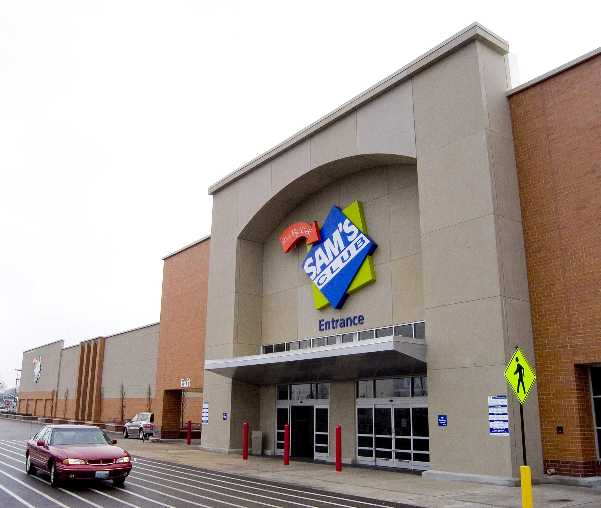 The storefront entrance of a Sam's Club warehouse store