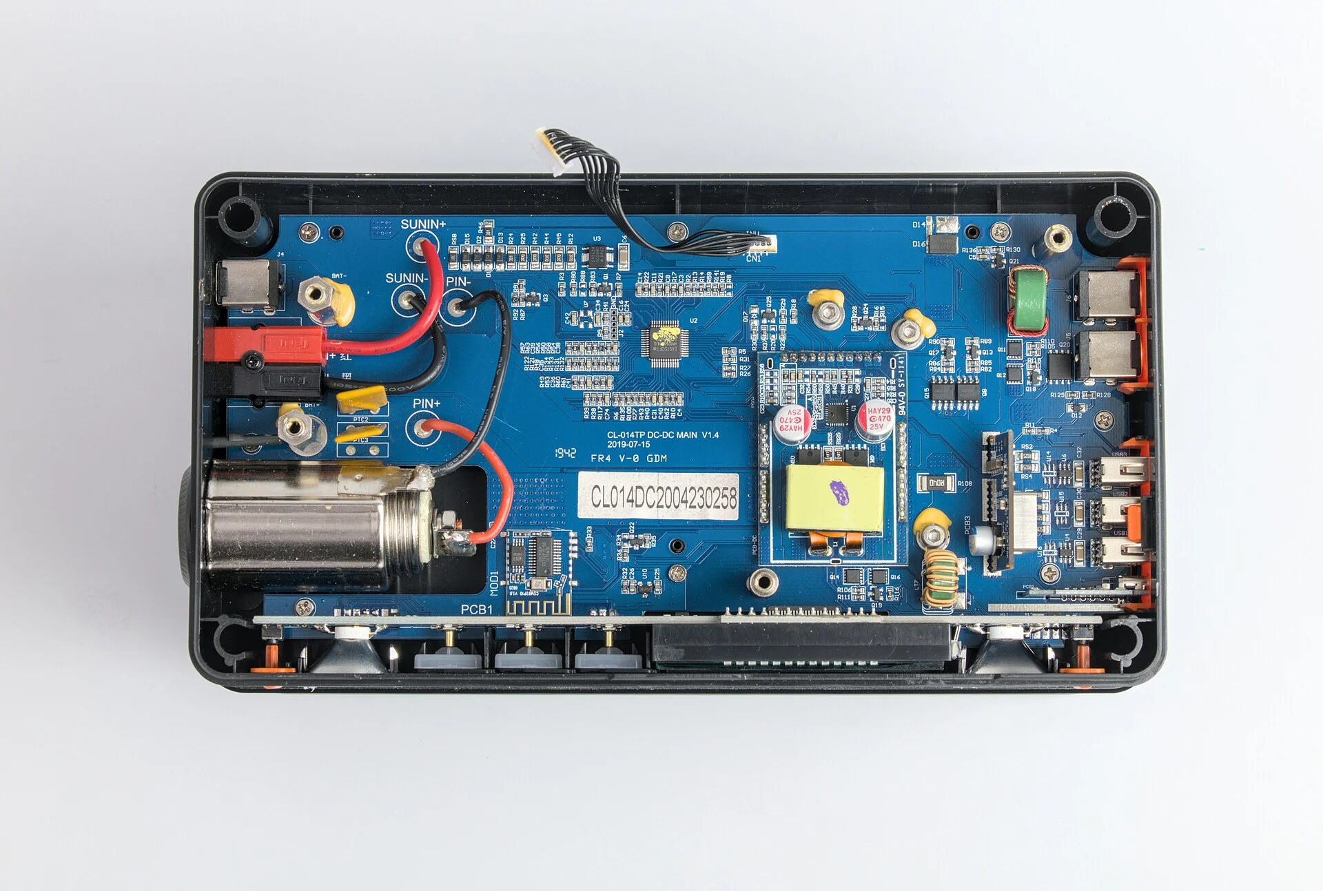 An Allpowers S300 portable power station opened up to show its internal battery pack and circuit board.