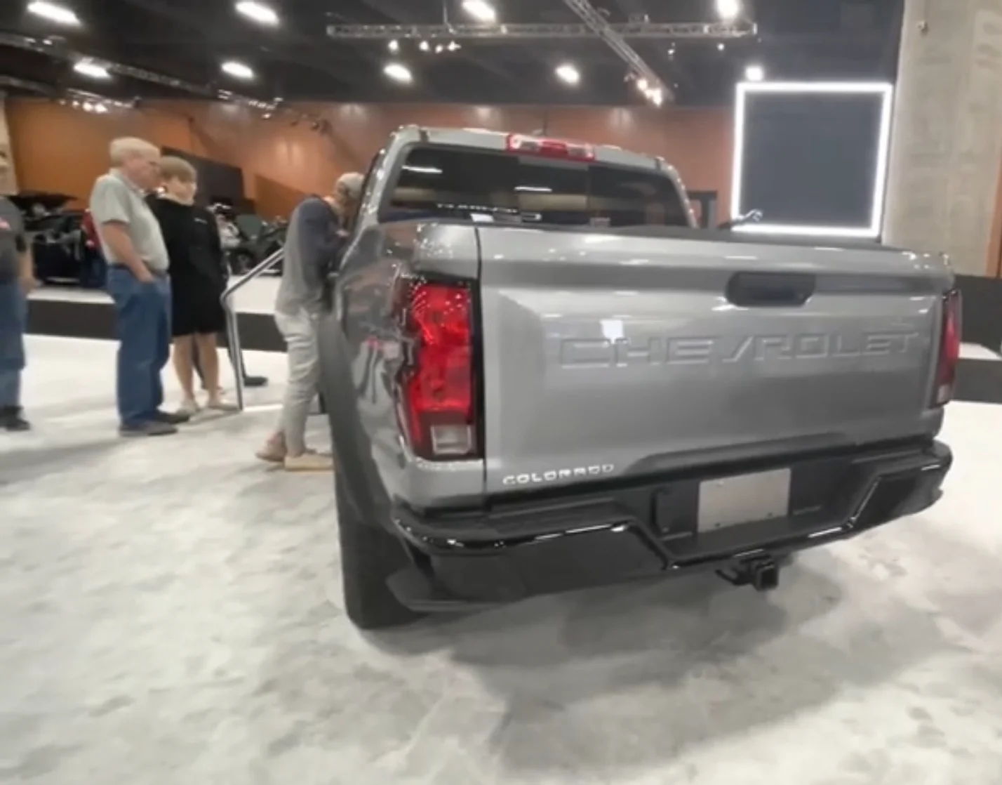Chevy Colorado — a grey 2023 Colorado, rear three-quarter view (the hitch area used for towing)