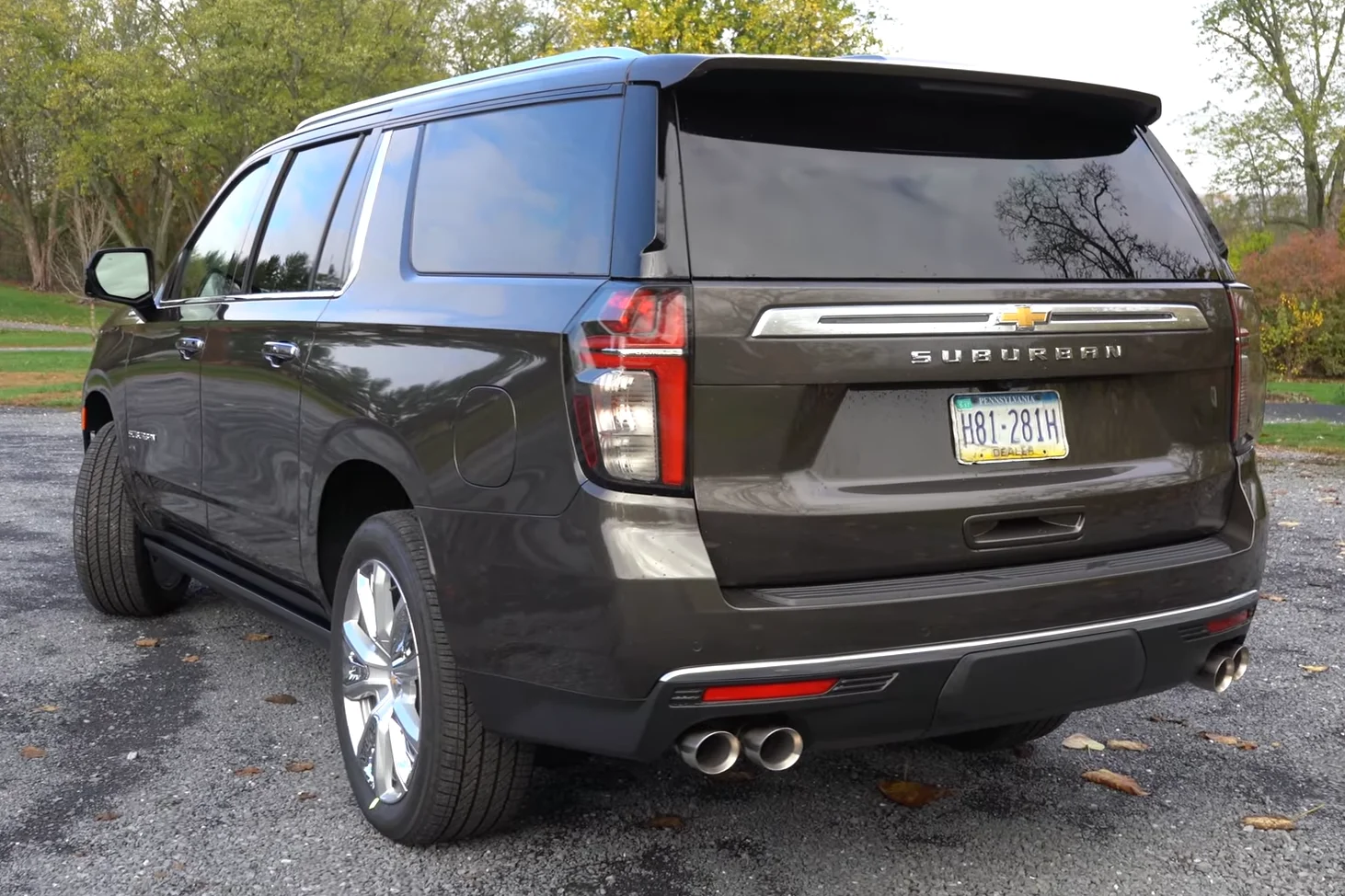 Chevy Suburban High Country — a brown 2021 Suburban, rear view with dual exhaust