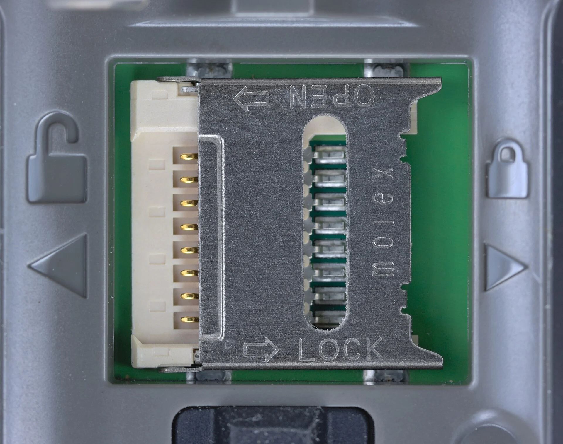 A microSD card slot on a circuit board, the SD slot a dashcam reads and writes footage through
