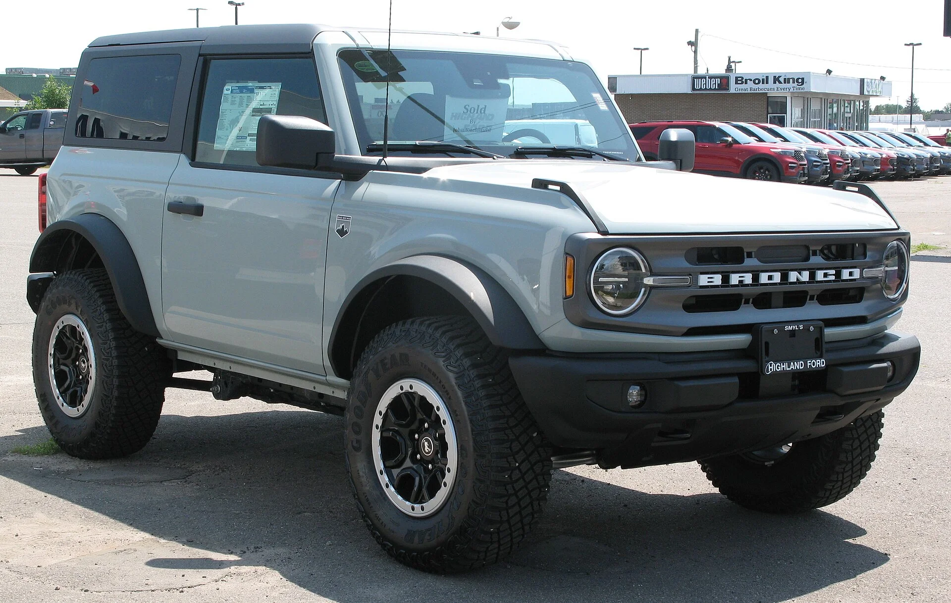 Grey Ford Bronco Big Bend two-door with off-road tires