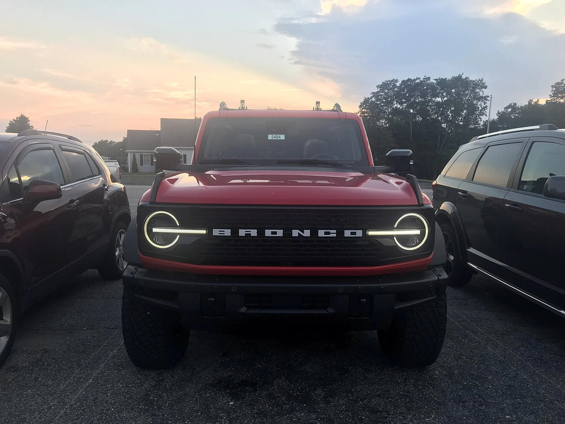 Red Ford Bronco Wildtrak four-door with the soft top