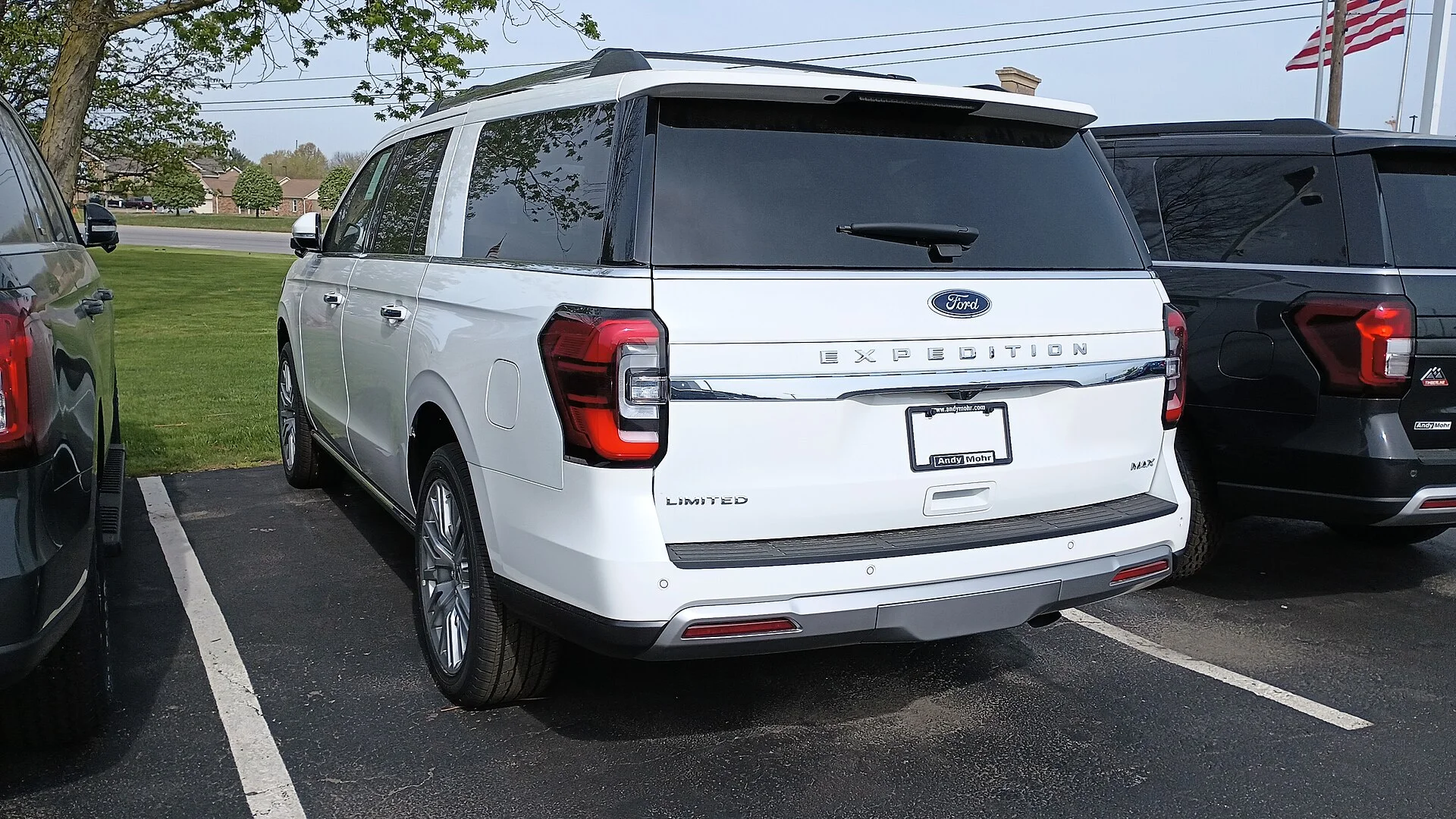 Ford Expedition MAX — a white 2023 Expedition, rear view (the spare tire mounts under the rear body)