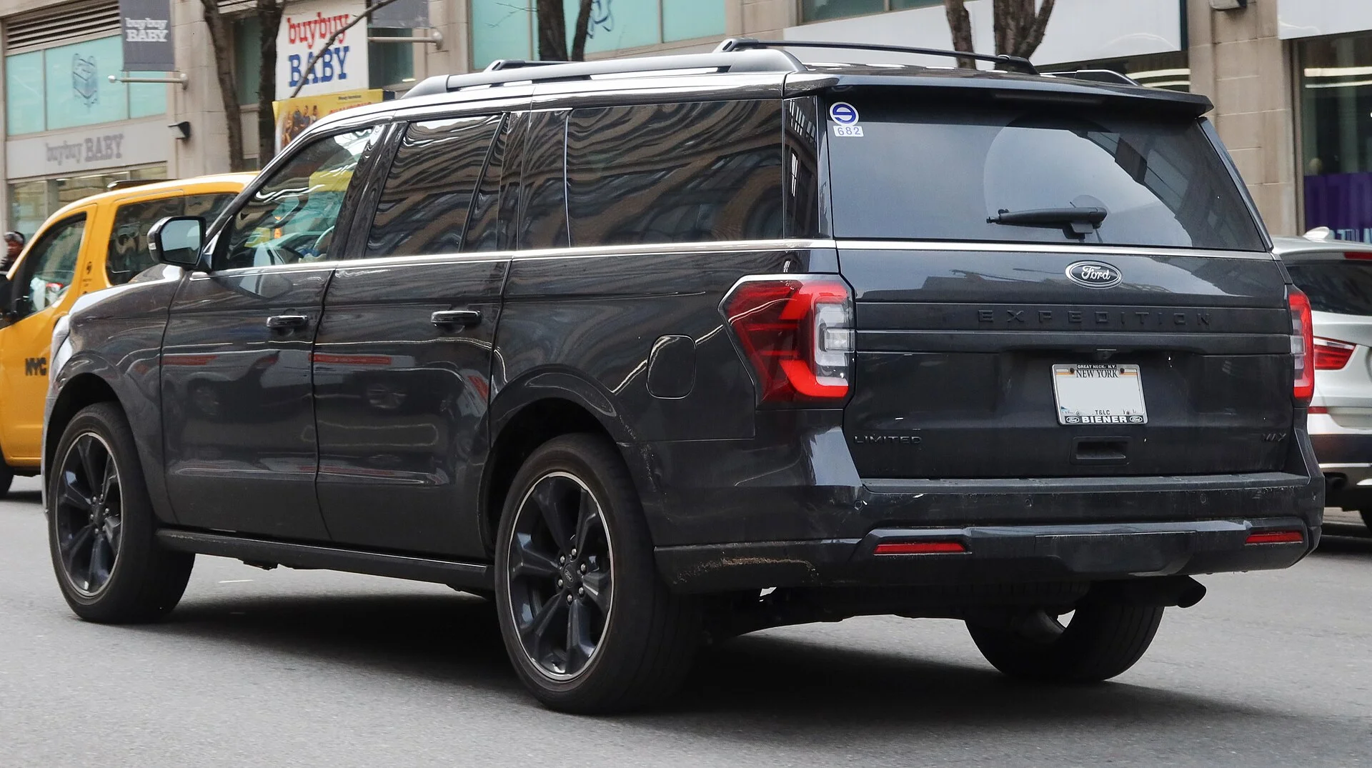 Ford Expedition MAX Limited — a black 2022 Expedition, rear three-quarter view