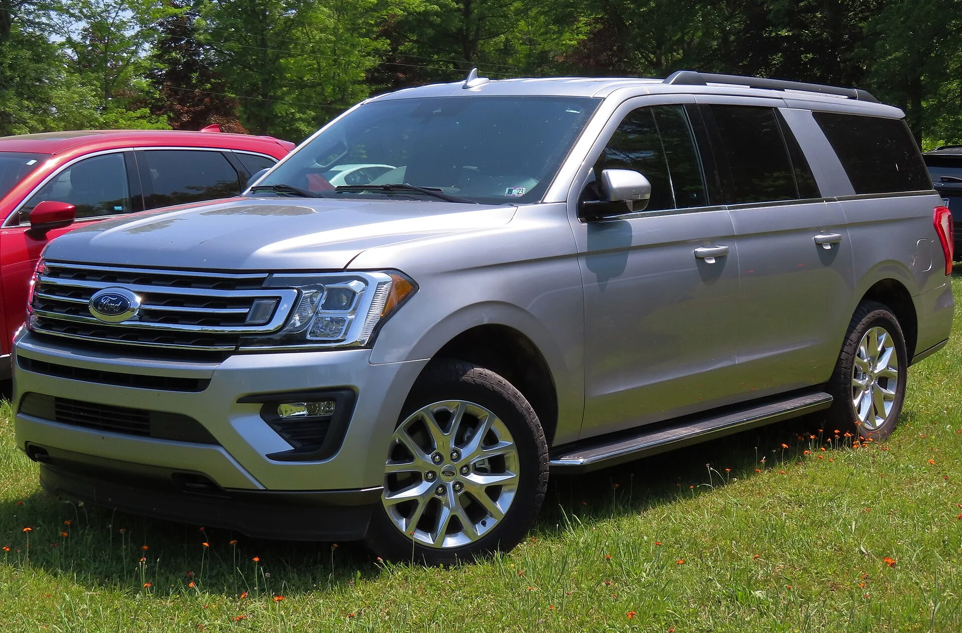 Ford Expedition XLT MAX — a silver 2021 Expedition 4WD, front three-quarter view