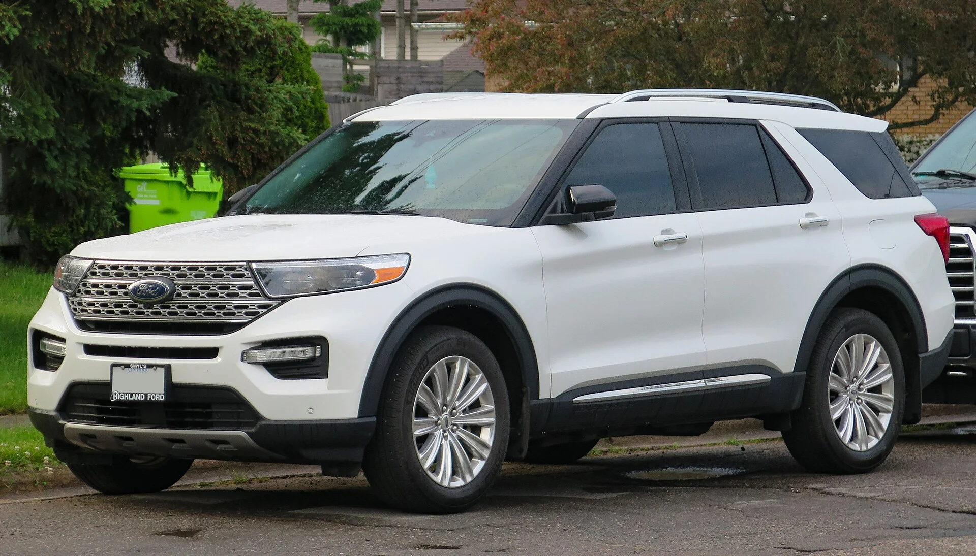 Ford Explorer Limited — a white 2023 Explorer, front three-quarter view