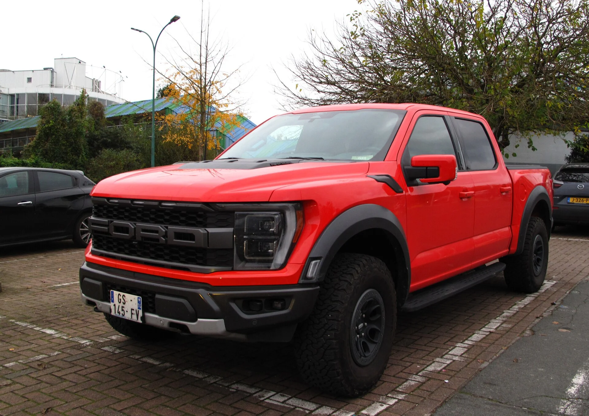 Red Ford F-150 Raptor, front view