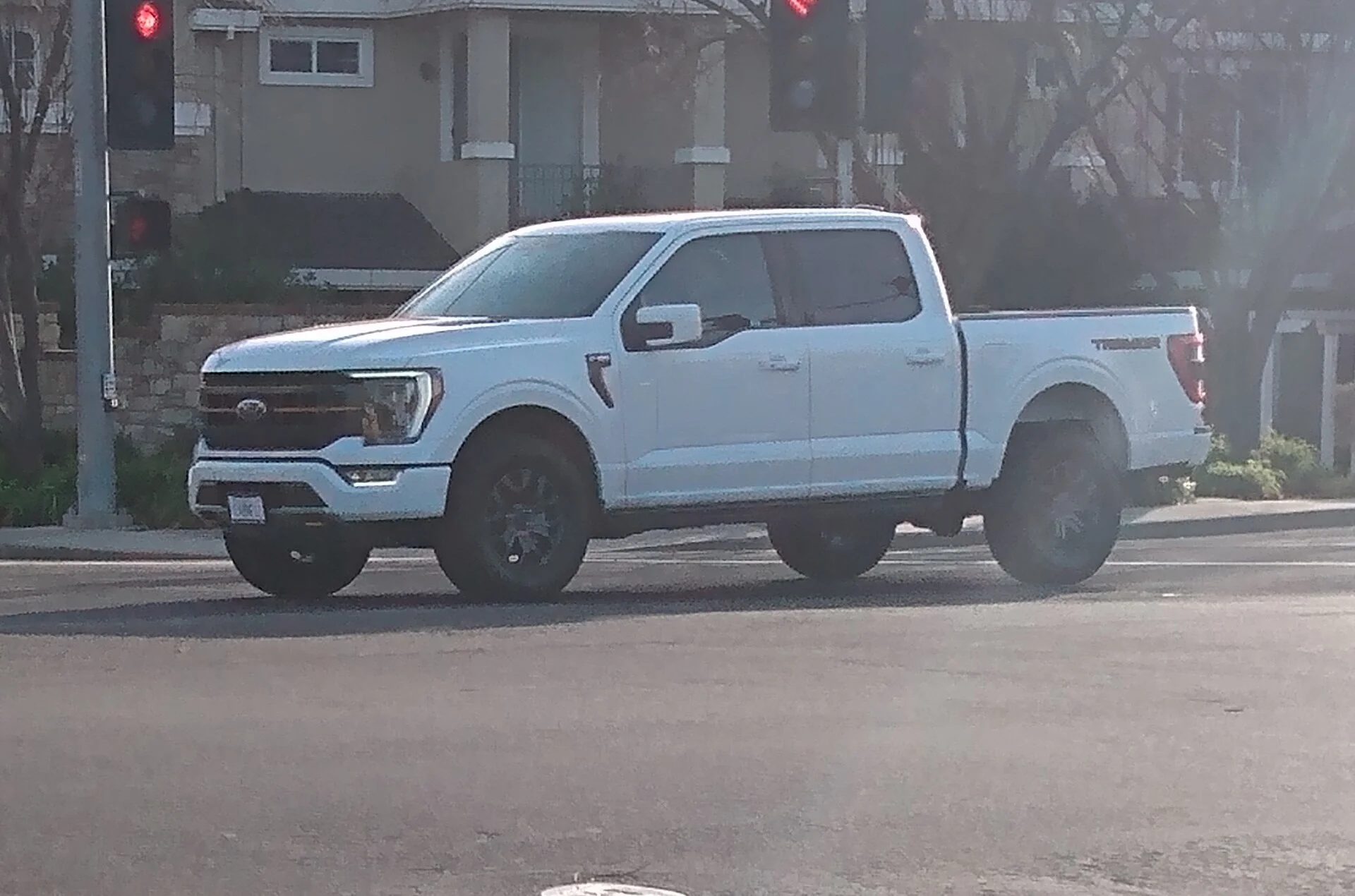 Ford F-150 Lariat — a 2021 F-150 on the road