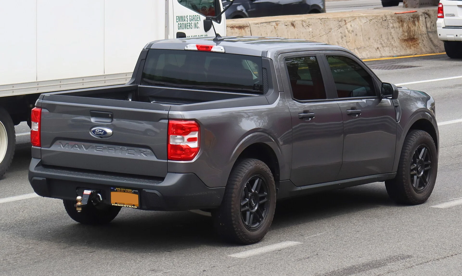 Ford Maverick XL — a grey 2022 Maverick, rear three-quarter view (the bed that carries the payload)