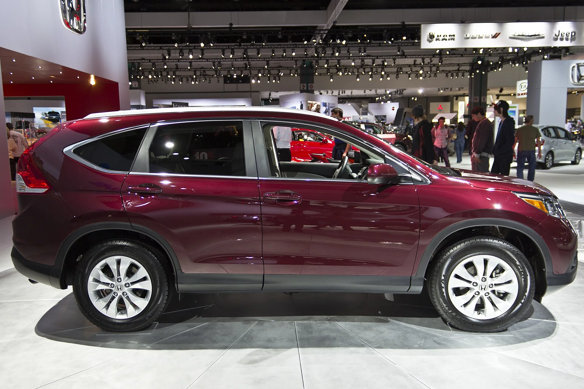 A maroon Honda CR-V side profile