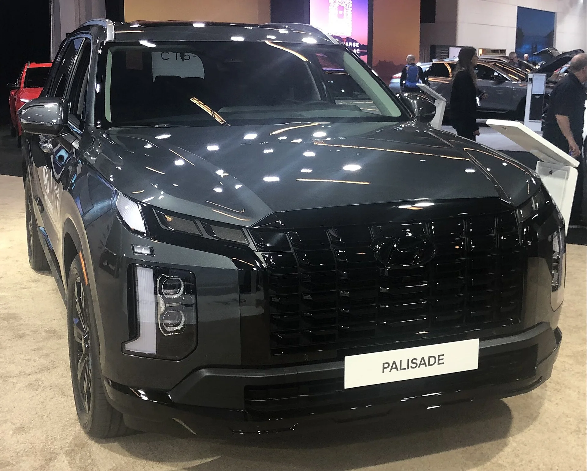 Hyundai Palisade at an auto show — a 2023 Palisade, front view