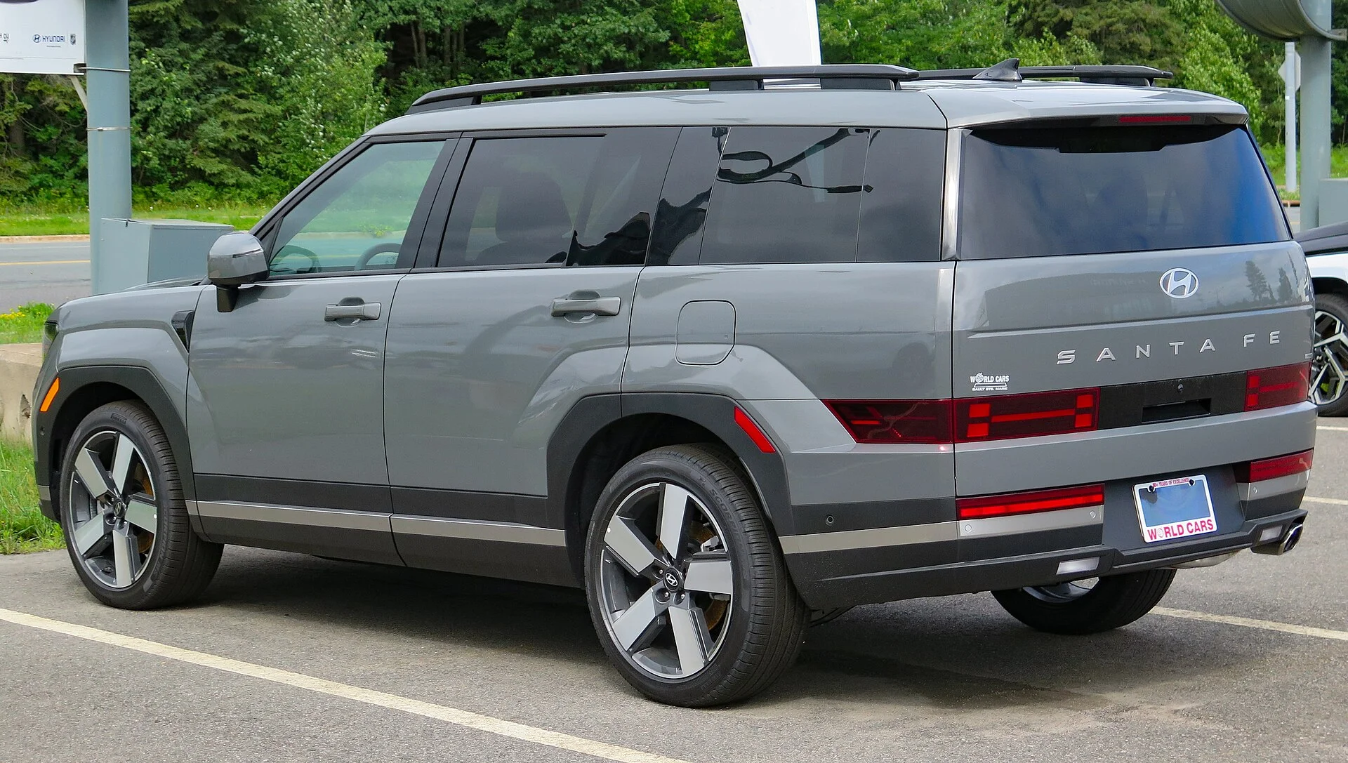 Hyundai Santa Fe Luxury — a 2024 Santa Fe, rear three-quarter view