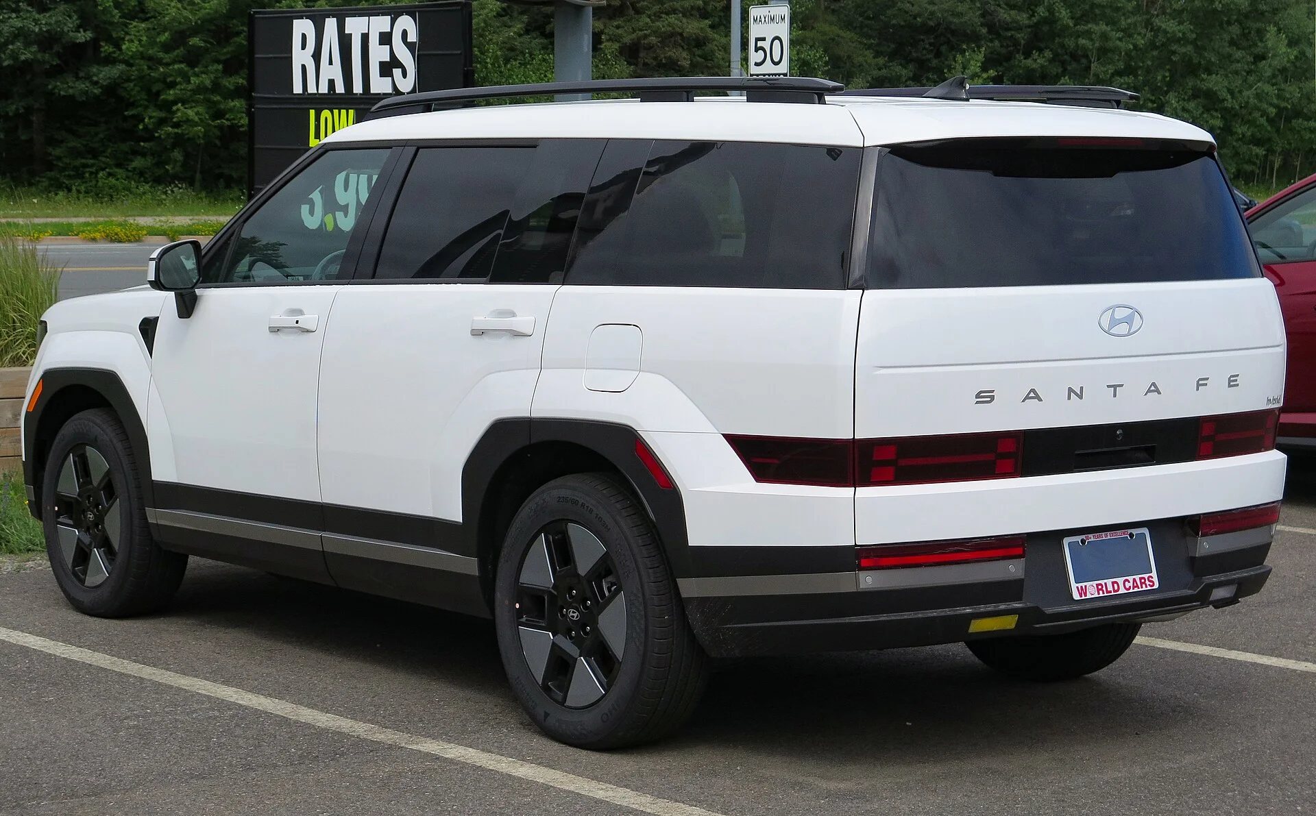 Hyundai Santa Fe Hybrid — a 2024 Santa Fe, rear view