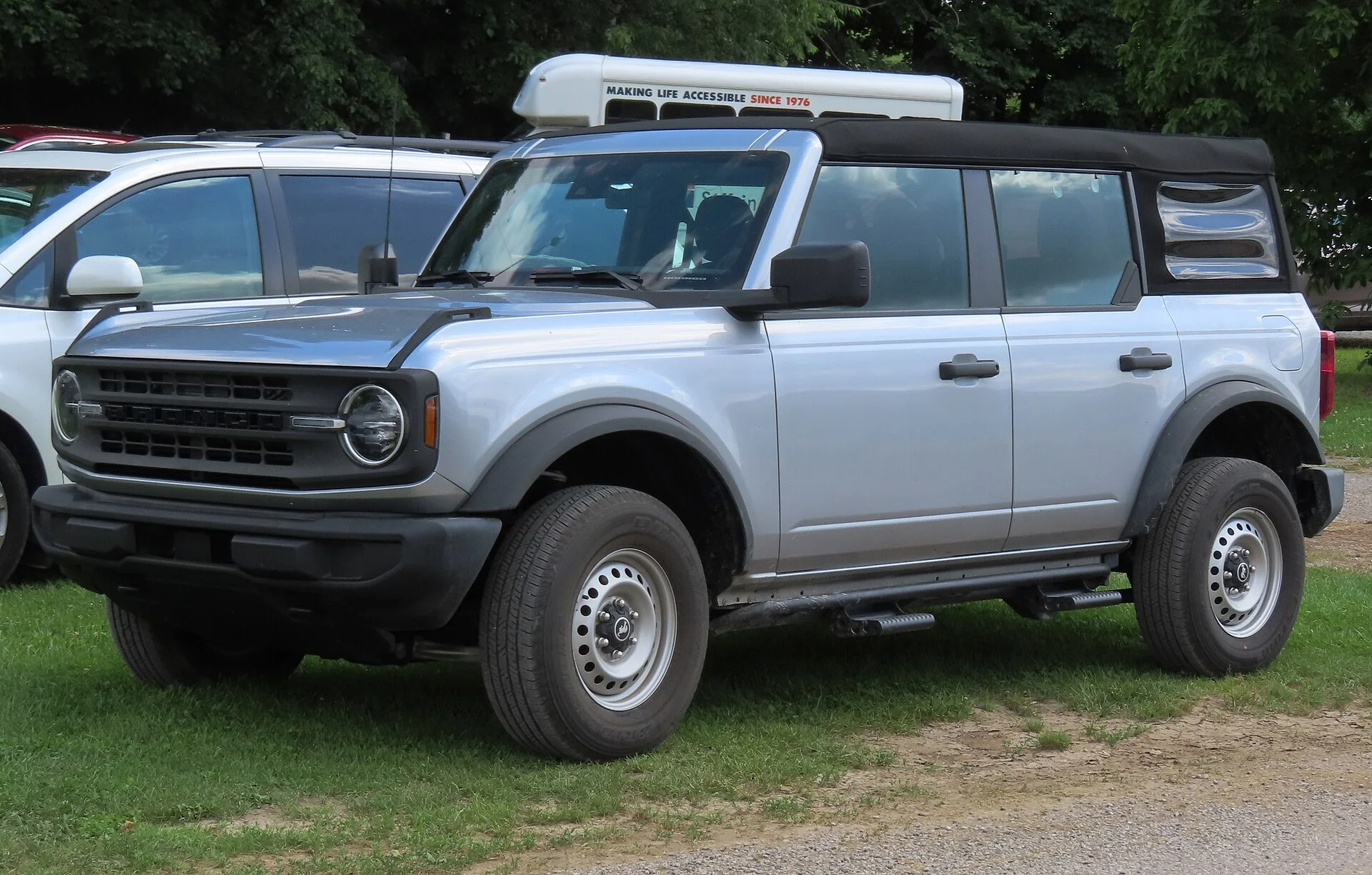 Silver Ford Bronco four-door, front three-quarter view