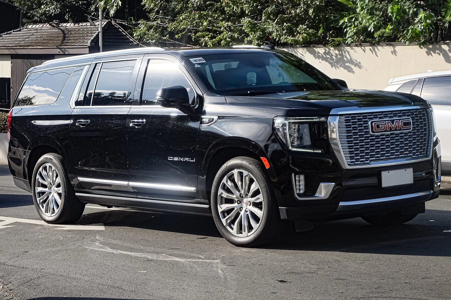 Black GMC Yukon Denali, current generation, front three-quarter view