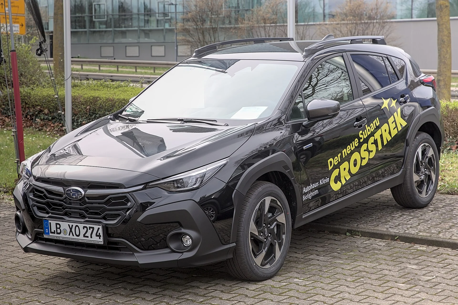 Black Subaru Crosstrek, current generation, front three-quarter view