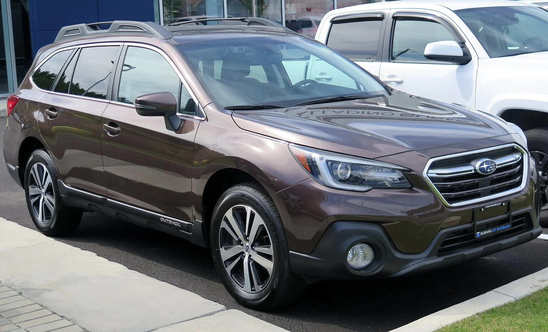 A brown Subaru Outback wagon ready for winter travel