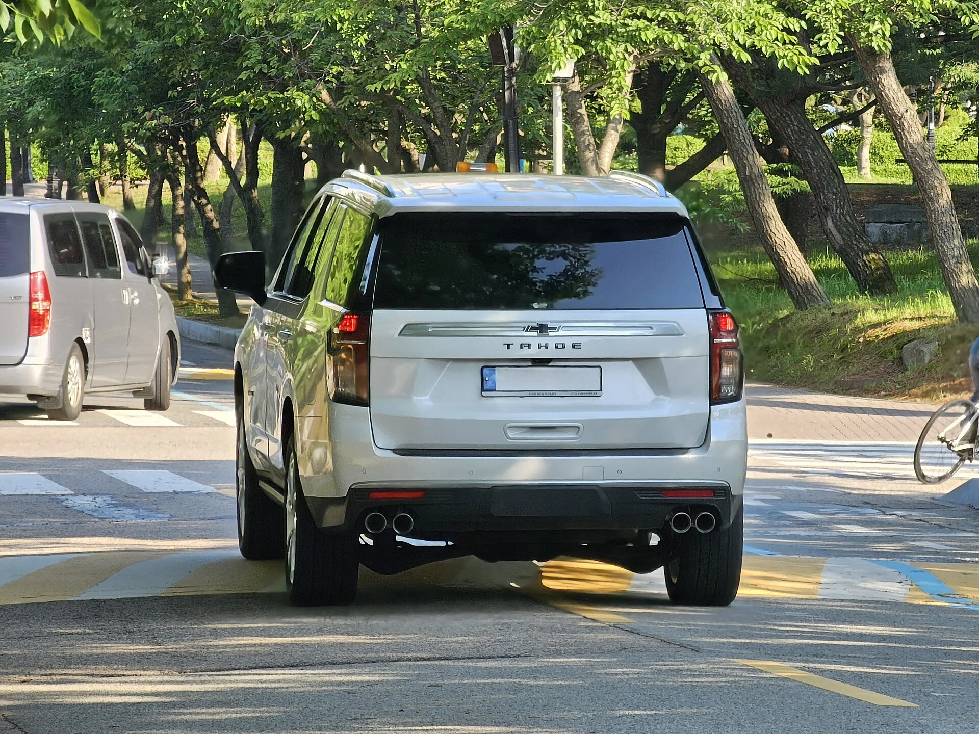 White Chevy Tahoe, current generation, rear view