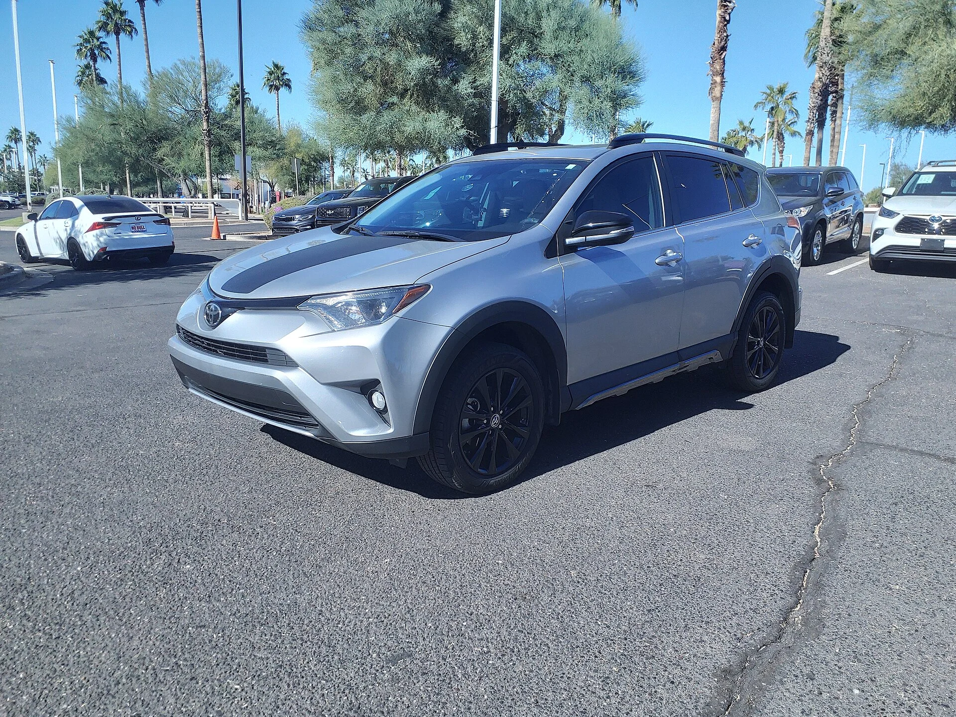 Grey Toyota RAV4 Adventure, current generation, side view