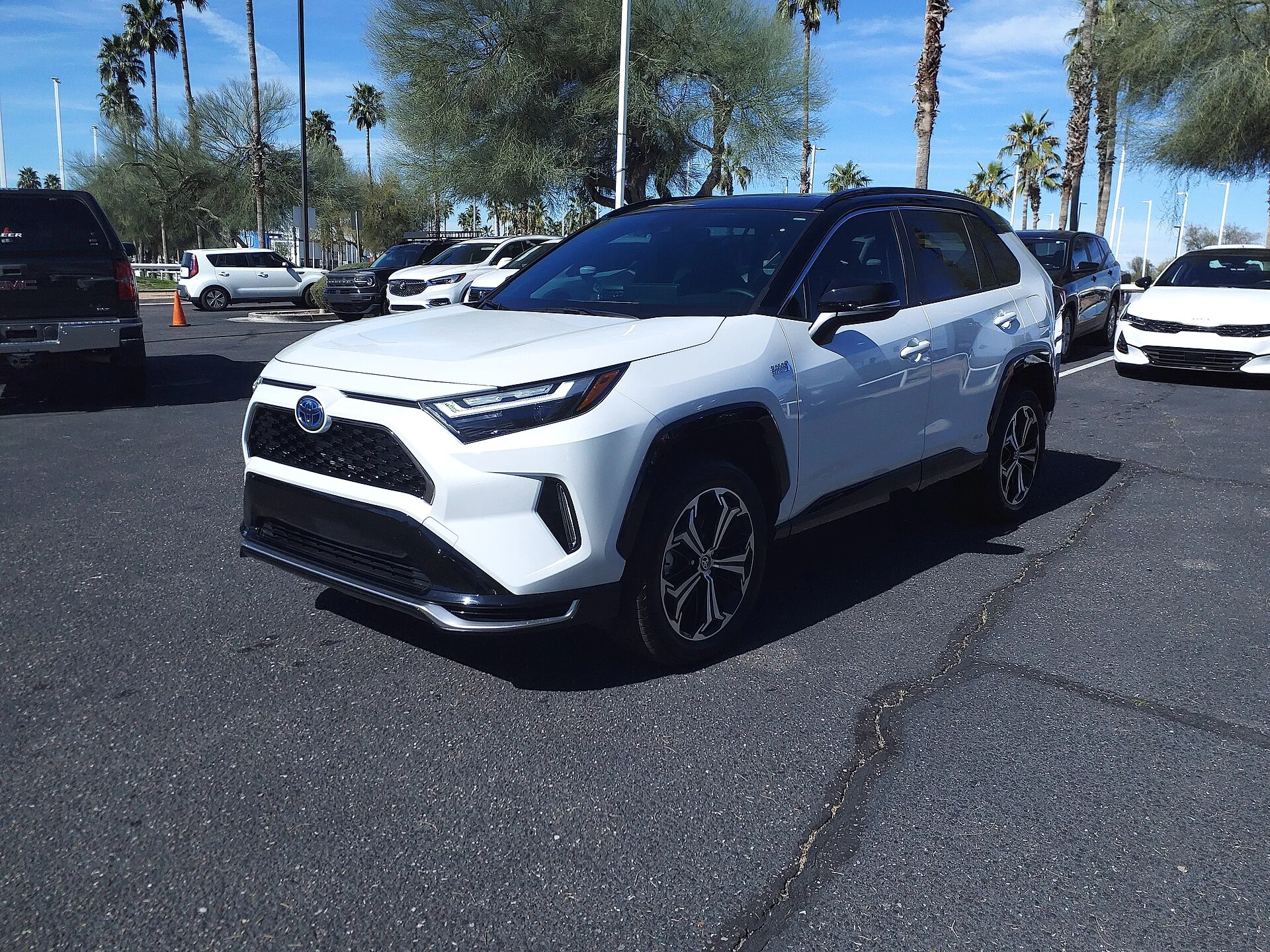 White Toyota RAV4 Prime, current generation, front three-quarter view