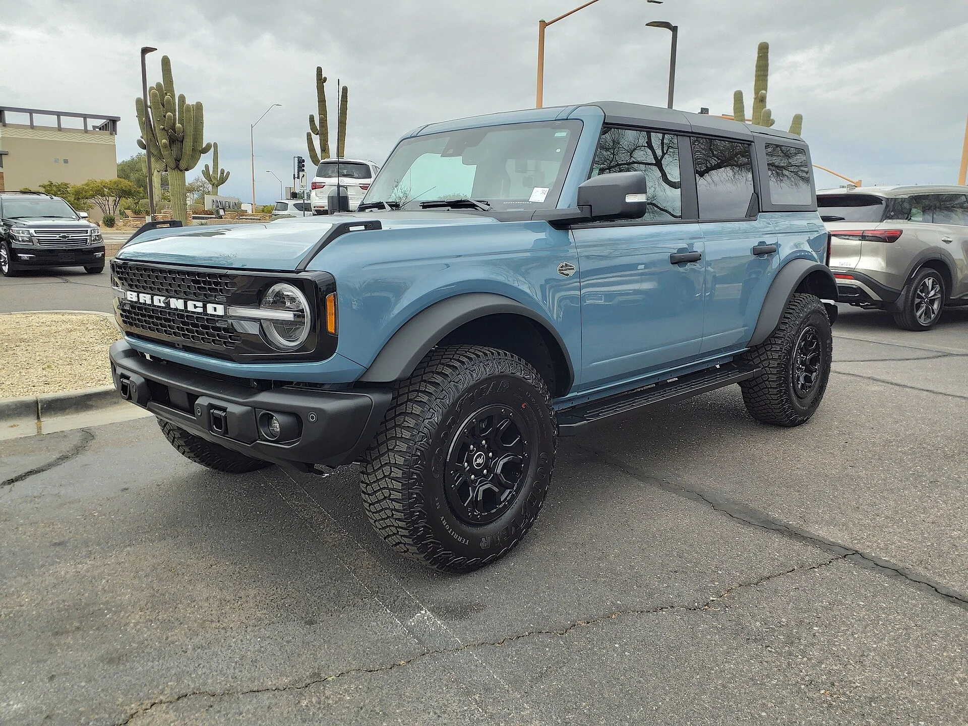 Green Ford Bronco Wildtrak four-door, front three-quarter view