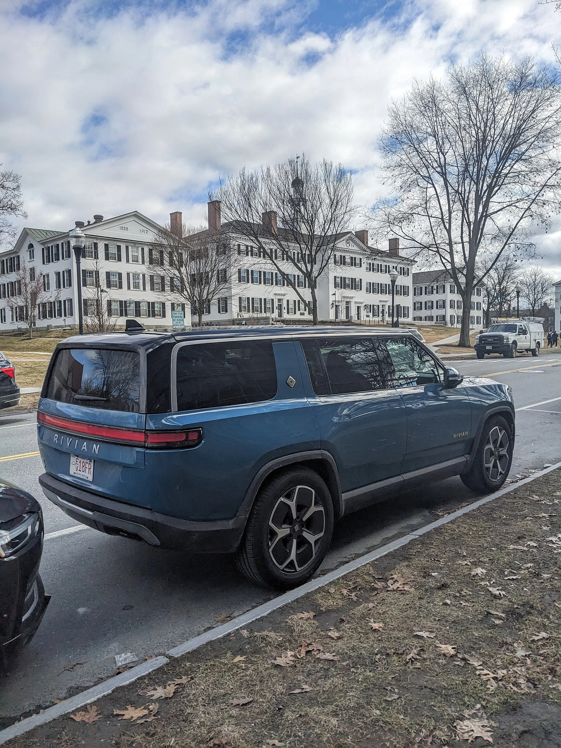 Rivian R1S in blue, side profile