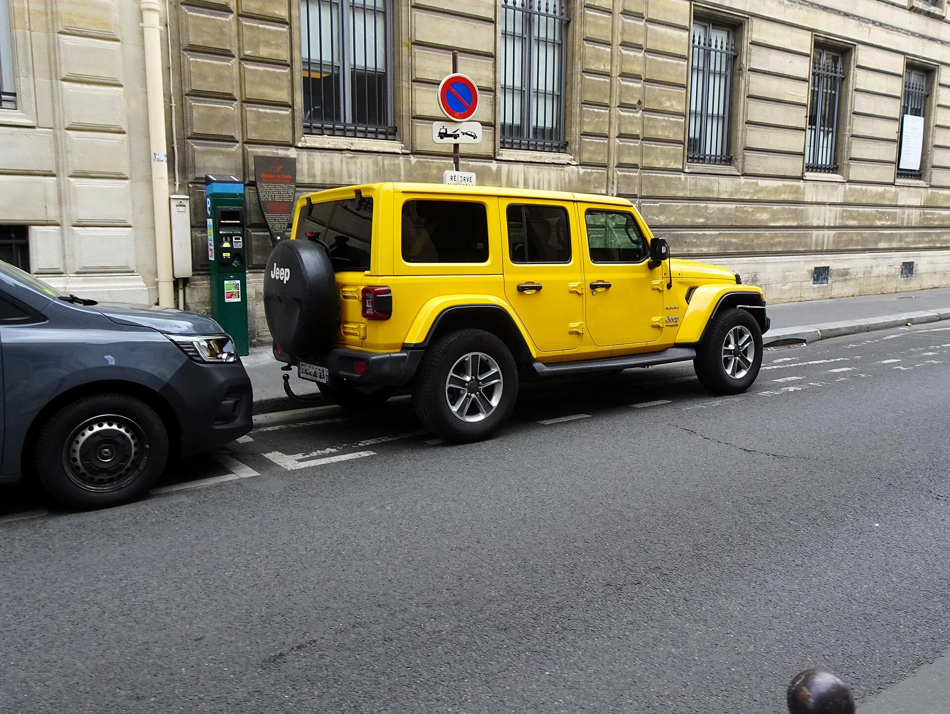 Jeep Wrangler Unlimited Sahara — side view showing running ground clearance
