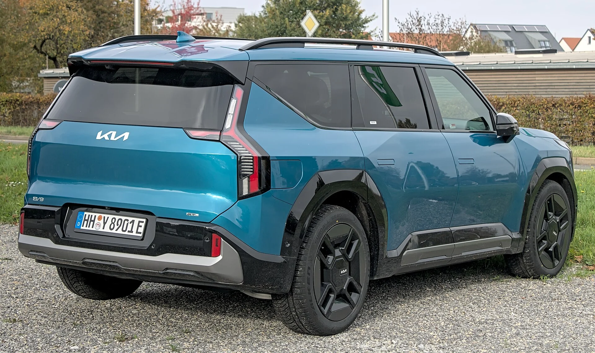 Teal Kia EV9 GT-Line, rear with roof rails