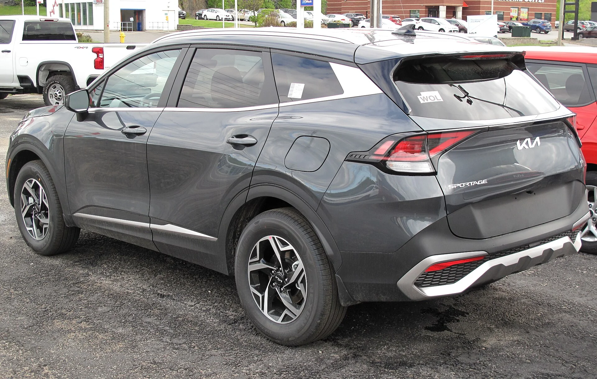 Grey Kia Sportage rear view (2023)