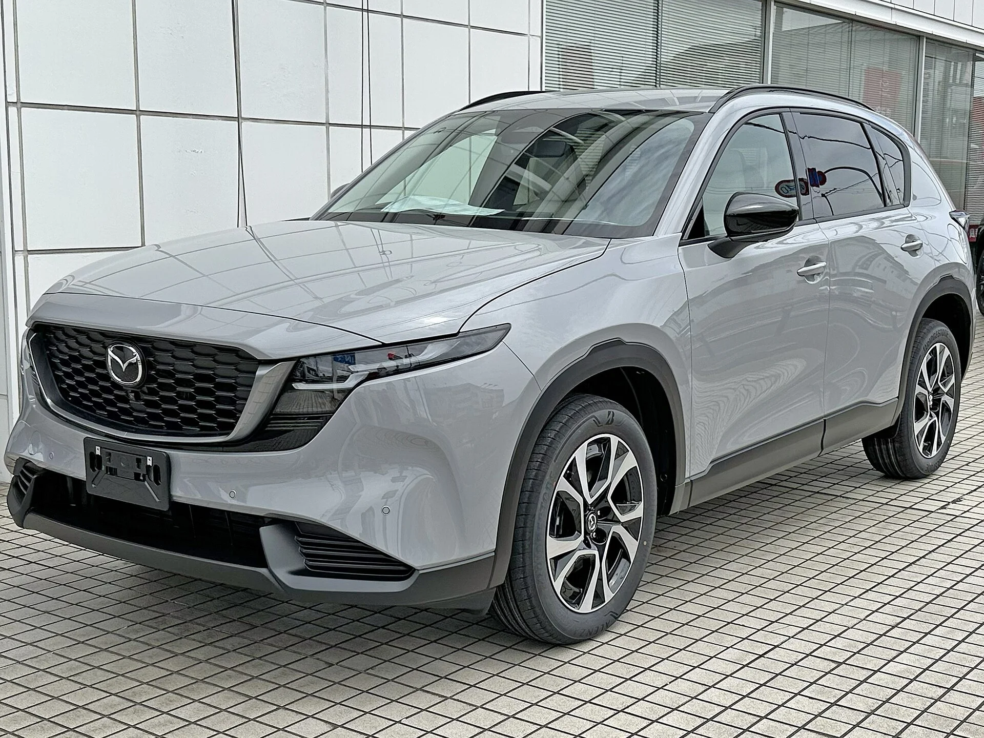 Grey Mazda CX-5, current generation, front three-quarter view