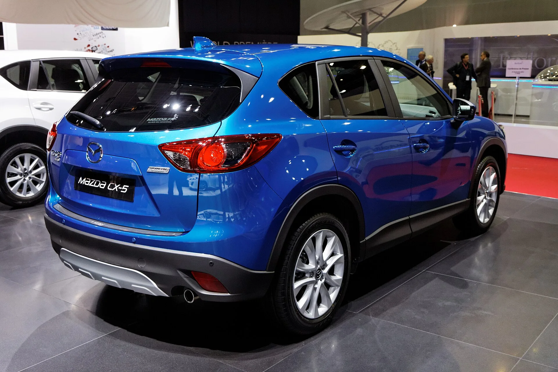 Mazda CX-5 (KF) in blue, rear three-quarter view