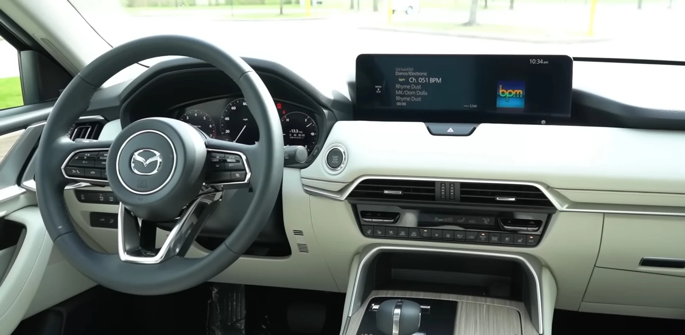 The Mazda CX-90's premium dashboard and cabin, the upscale interior that makes it a comfortable camper
