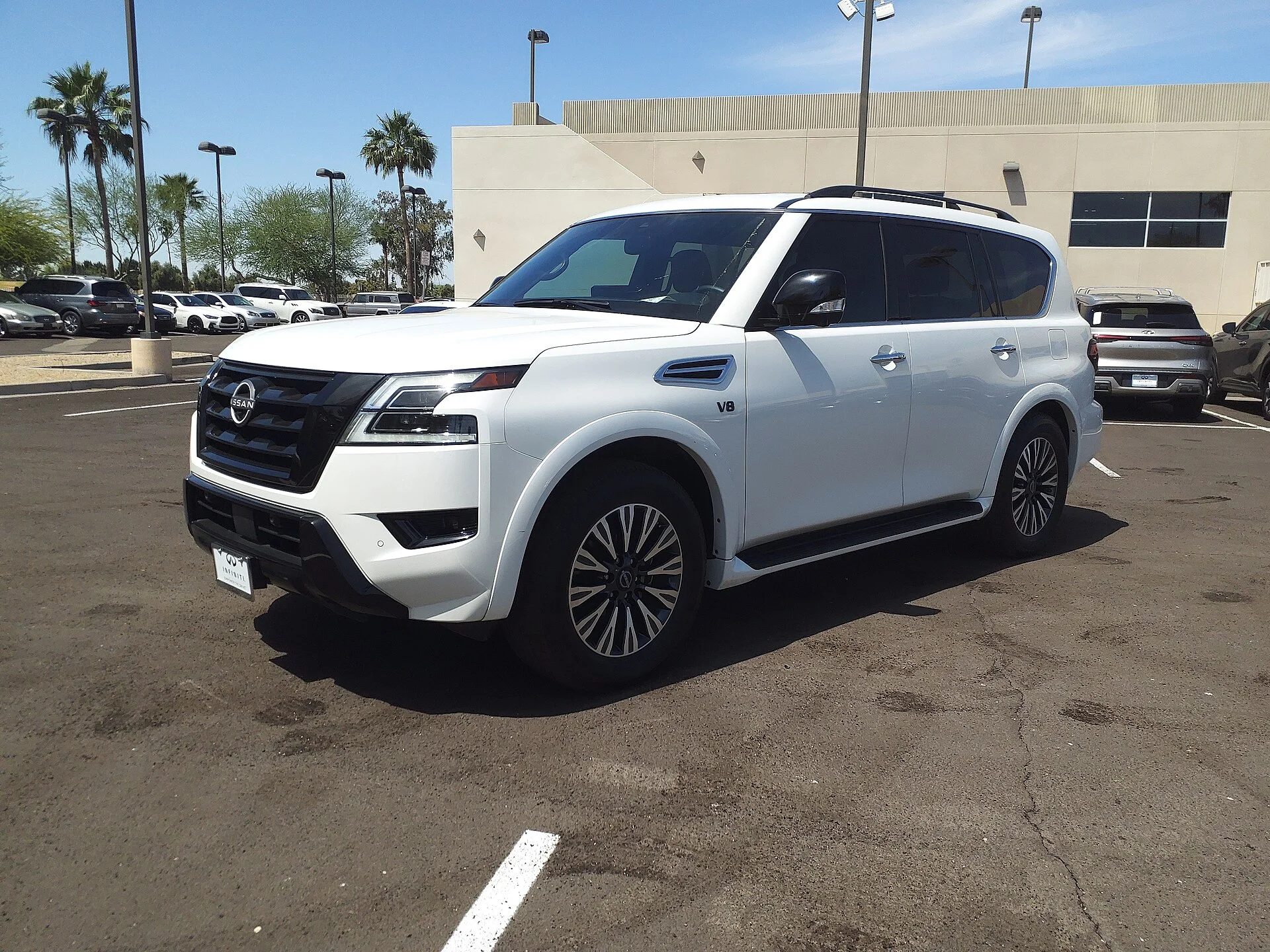 Nissan Armada SL — a white 2022 Armada, front three-quarter view