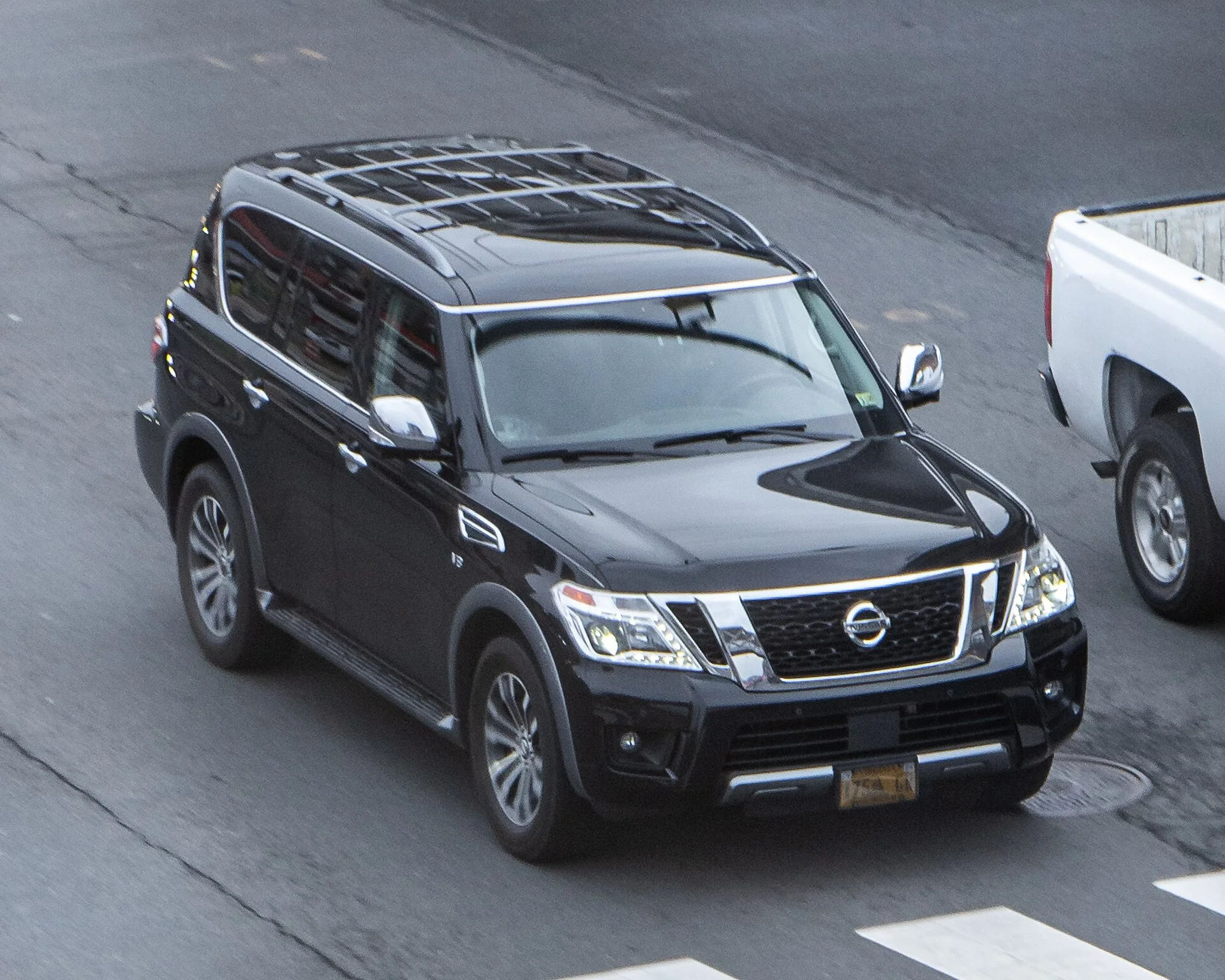Nissan Armada — a black Armada, front three-quarter view