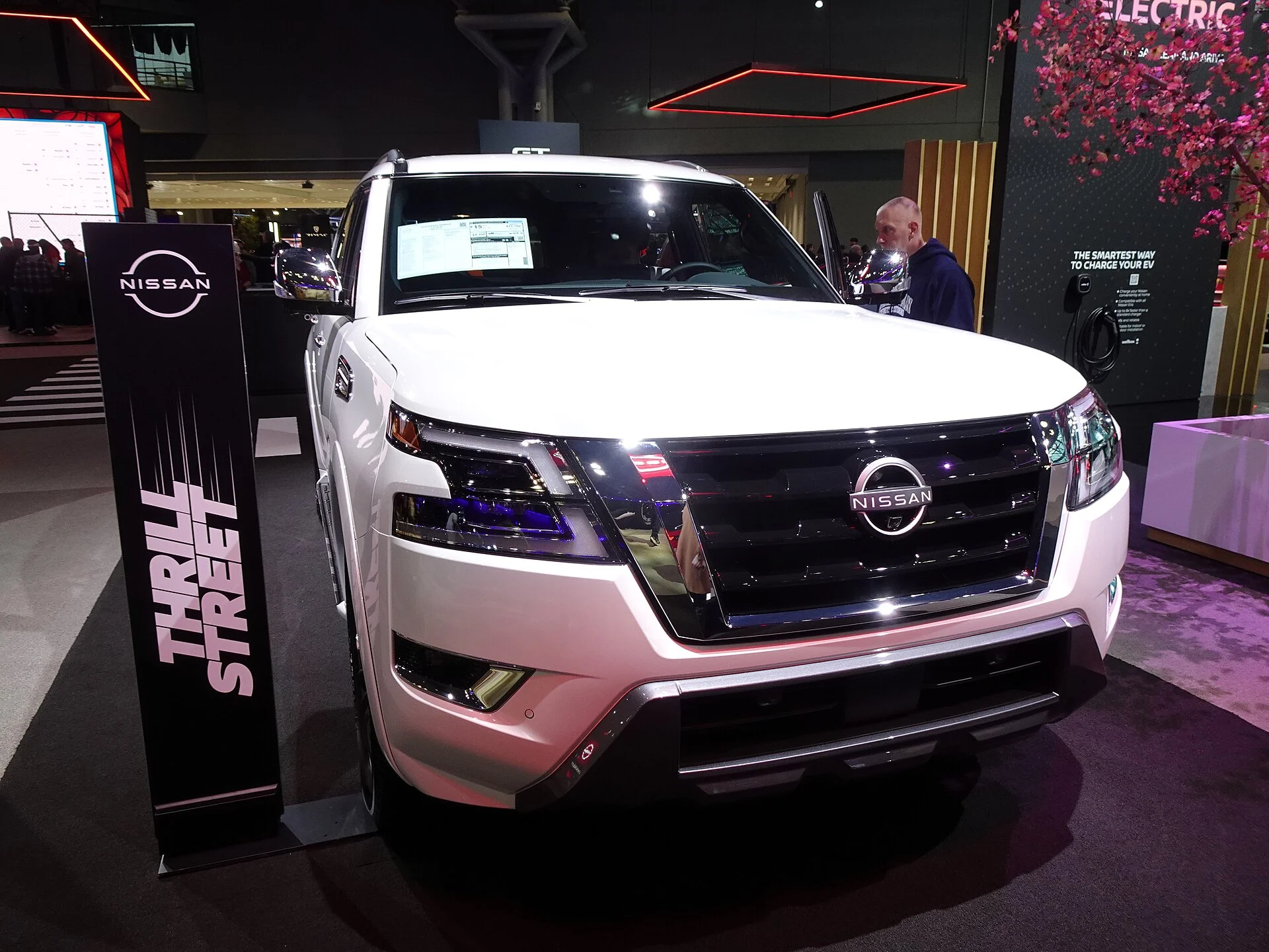 Nissan Armada Platinum — a white 2024 Armada 4WD, front three-quarter view