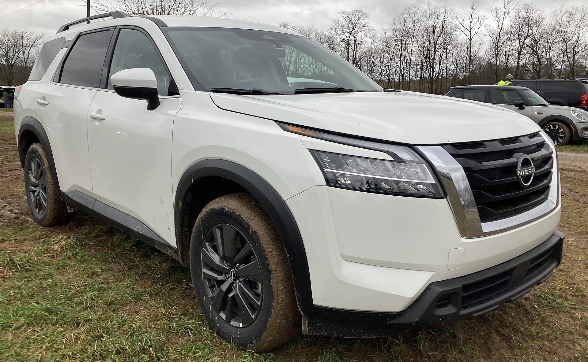 Nissan Pathfinder SV — a white 2022 Pathfinder, front three-quarter view