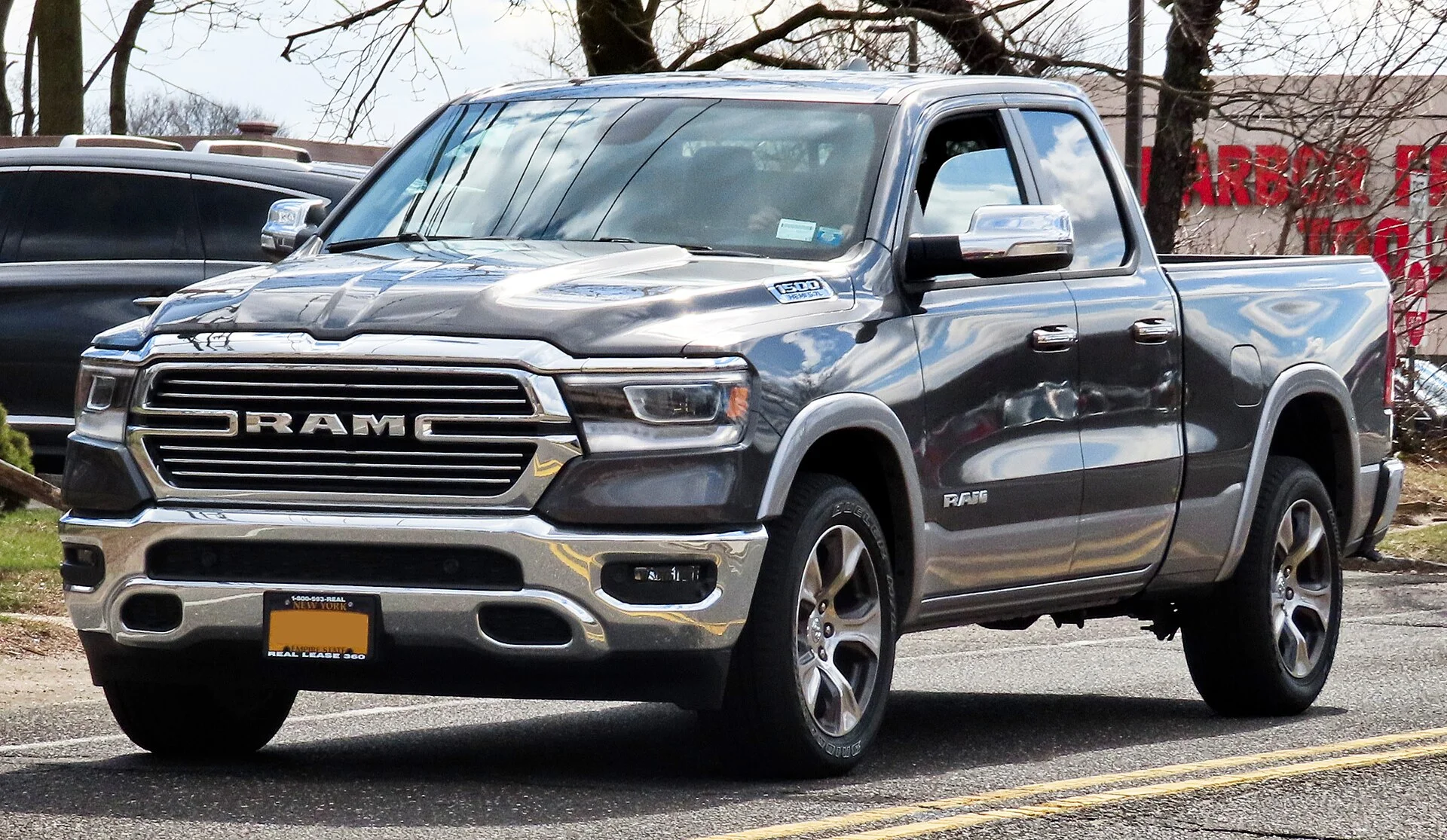 Ram 1500 Laramie — a grey 2020 Ram 1500, front three-quarter view