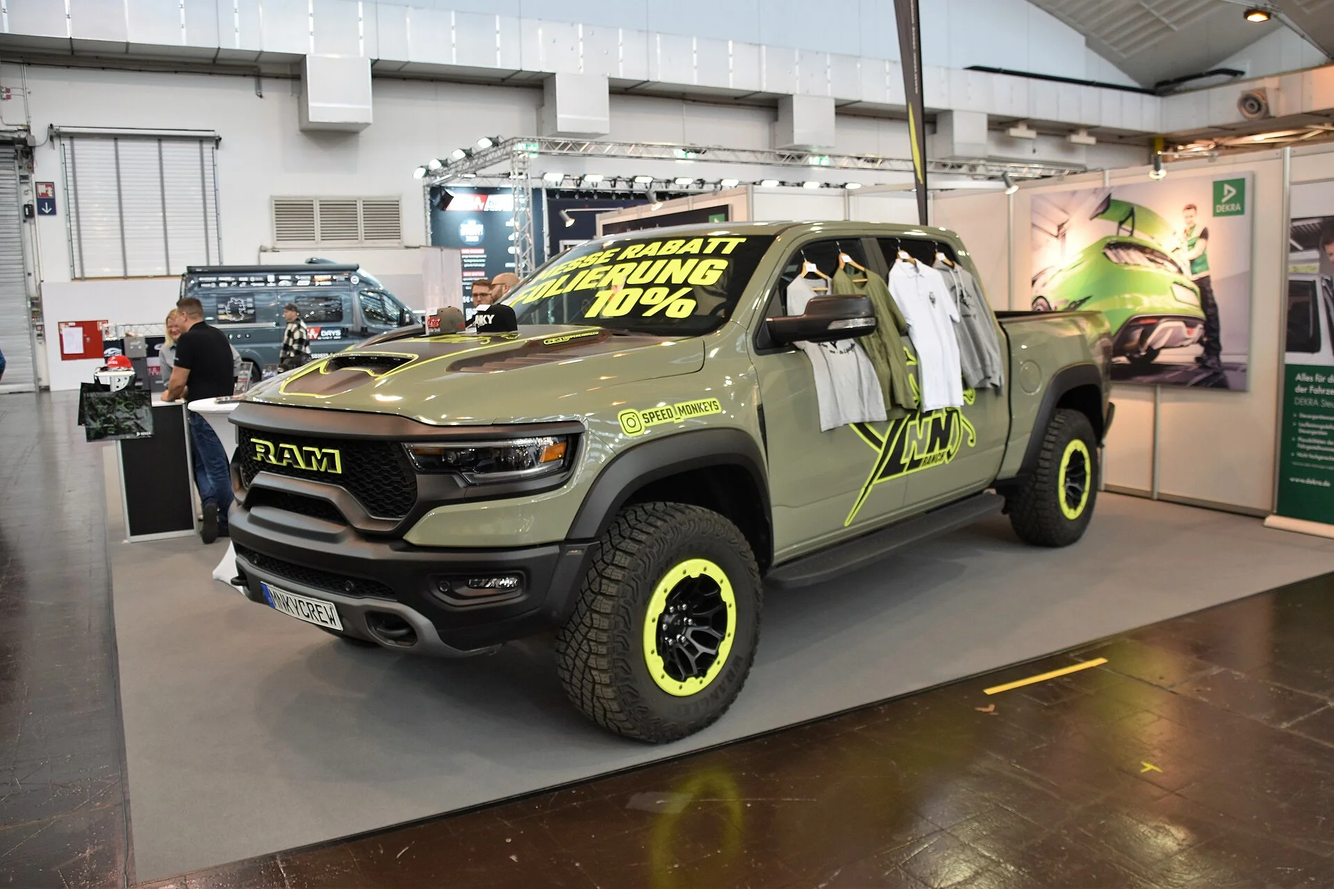 Ram 1500 TRX — an olive-green 2022 Ram 1500 TRX (the high-clearance off-road variant), front three-quarter view