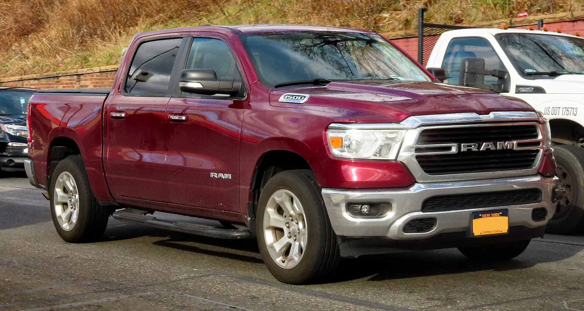 Ram 1500 Laramie — a red 2019 Ram 1500, front three-quarter view