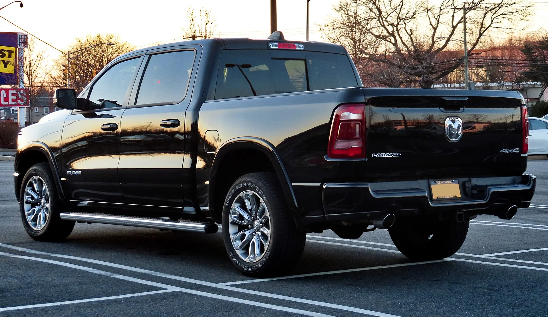 Ram 1500 Laramie — a black 2019 Ram 1500, rear three-quarter view
