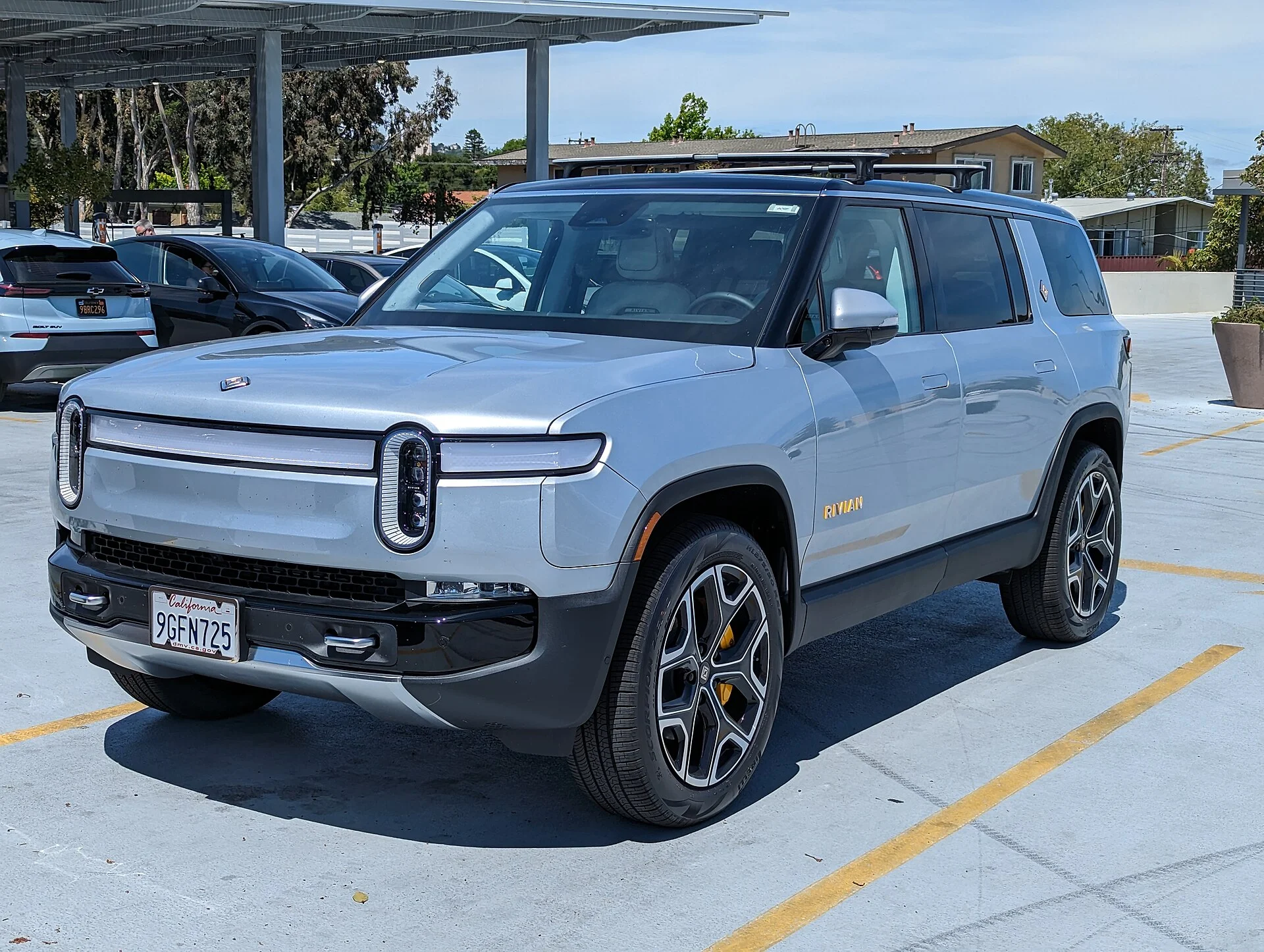 Silver Rivian R1S electric SUV, front three-quarter