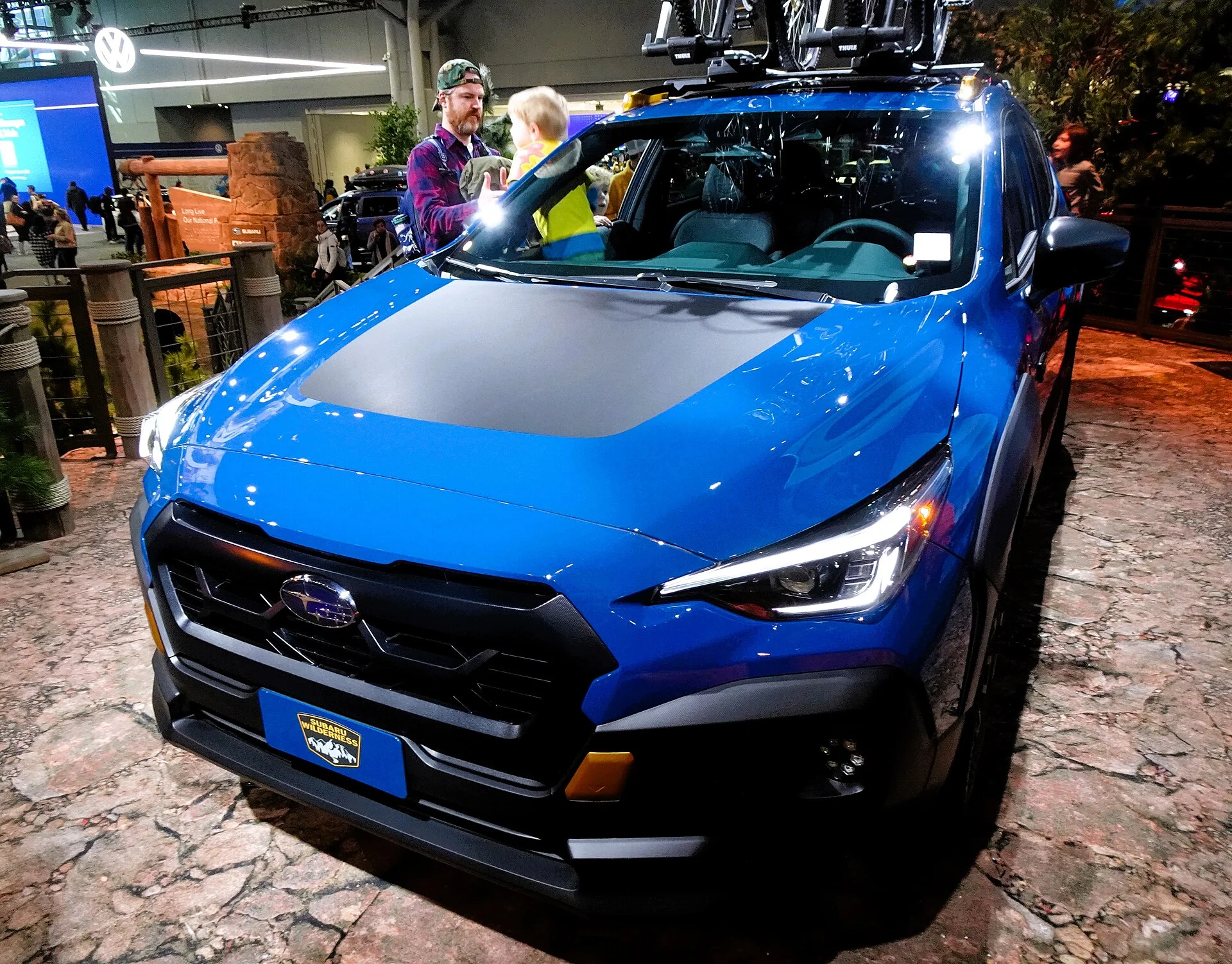 A Subaru Crosstrek Wilderness fitted with a roof rack, the rugged trim this Subaru Crosstrek camping guide covers for adventure and camping use.