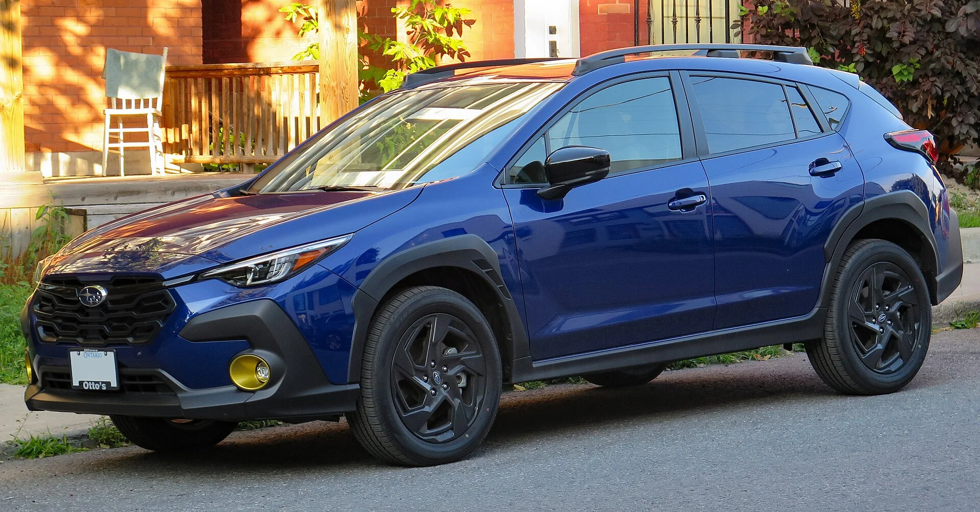 A Subaru Crosstrek (current generation, front three-quarter view) in Sapphire Blue, the compact SUV this Crosstrek camping guide is built around.