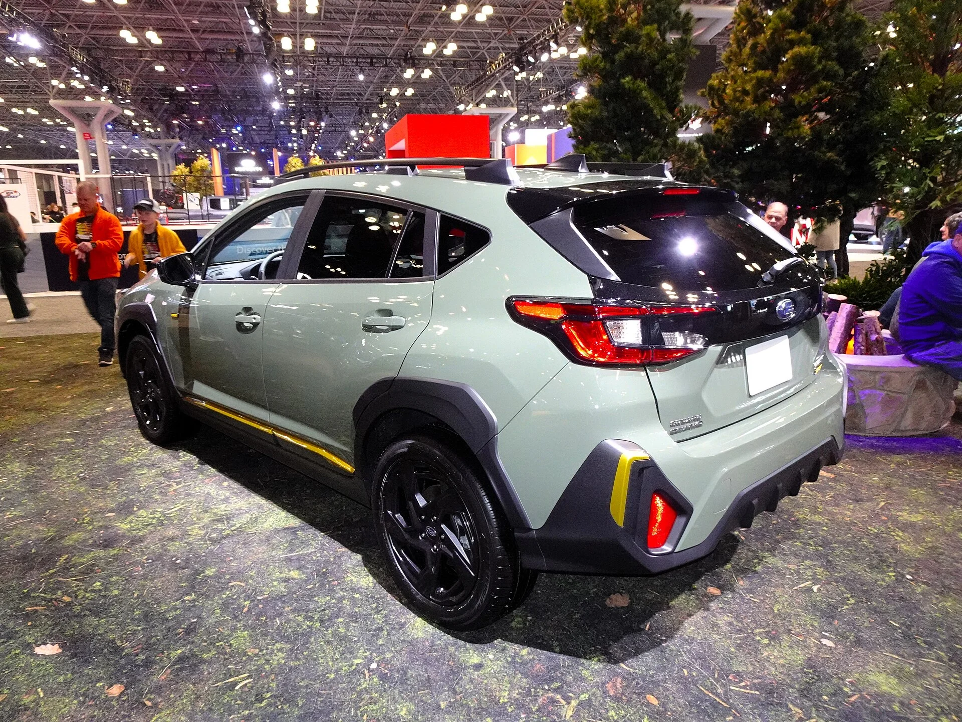 A Subaru Crosstrek (rear view), showing the liftgate and cargo opening relevant to a sleeping platform.