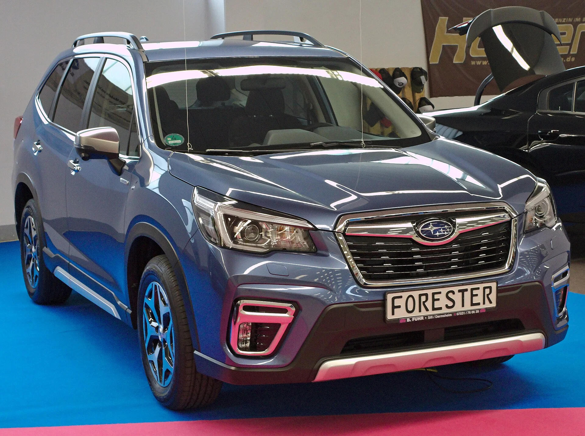 Subaru Forester e-BOXER — a grey Forester, front three-quarter view