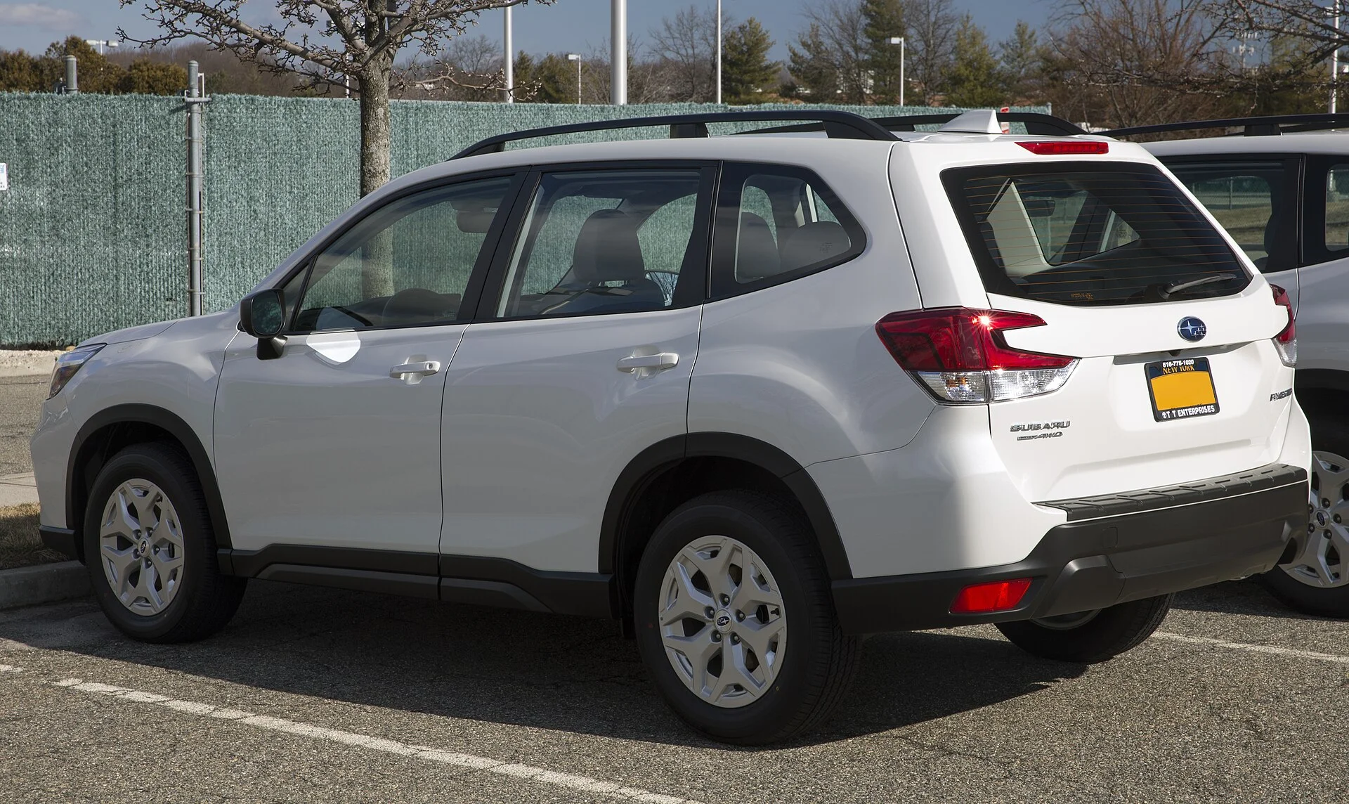 Subaru Forester — a white 2020 Forester, rear three-quarter view