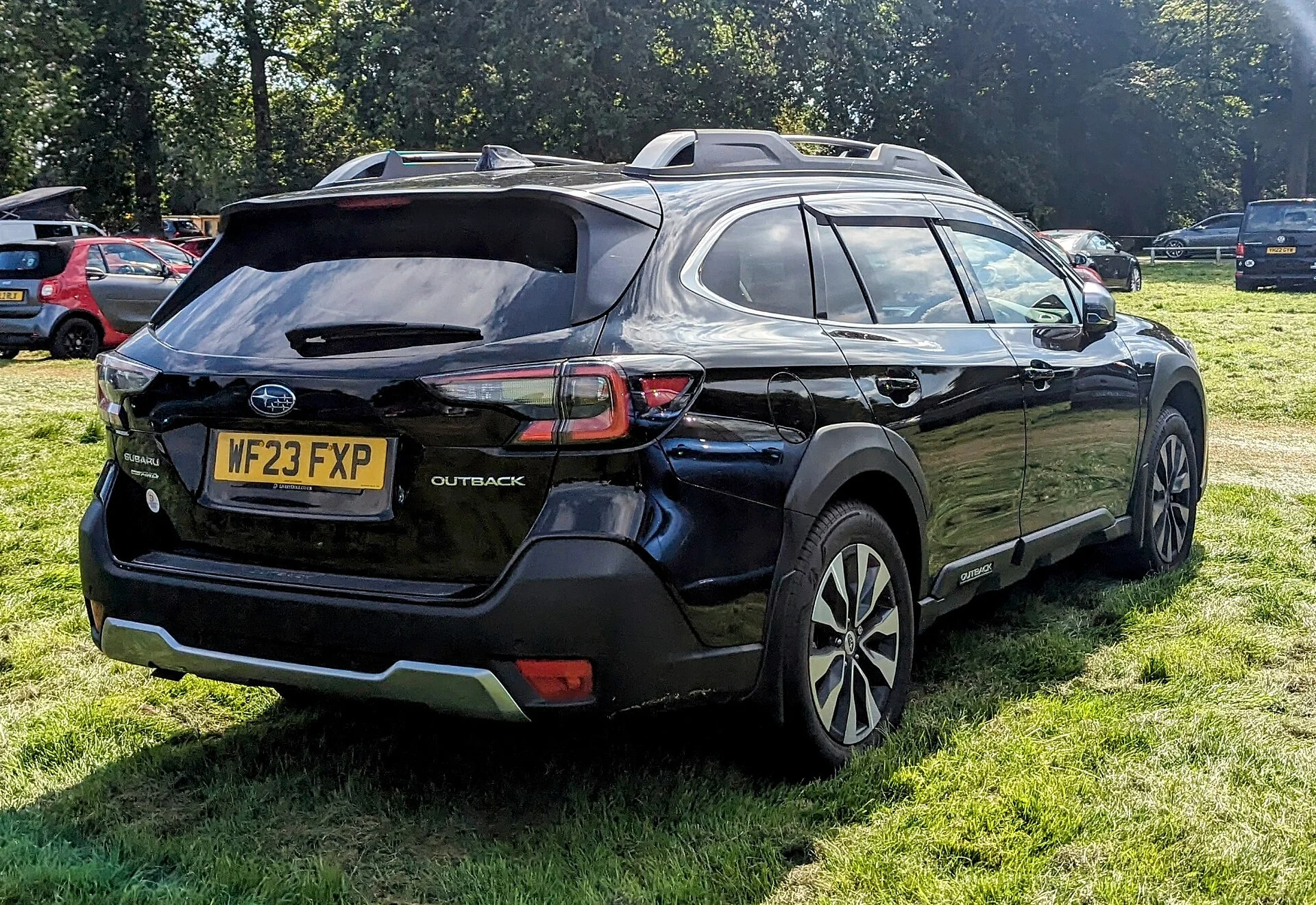 Subaru Outback Touring — a 2023 Outback, rear three-quarter view