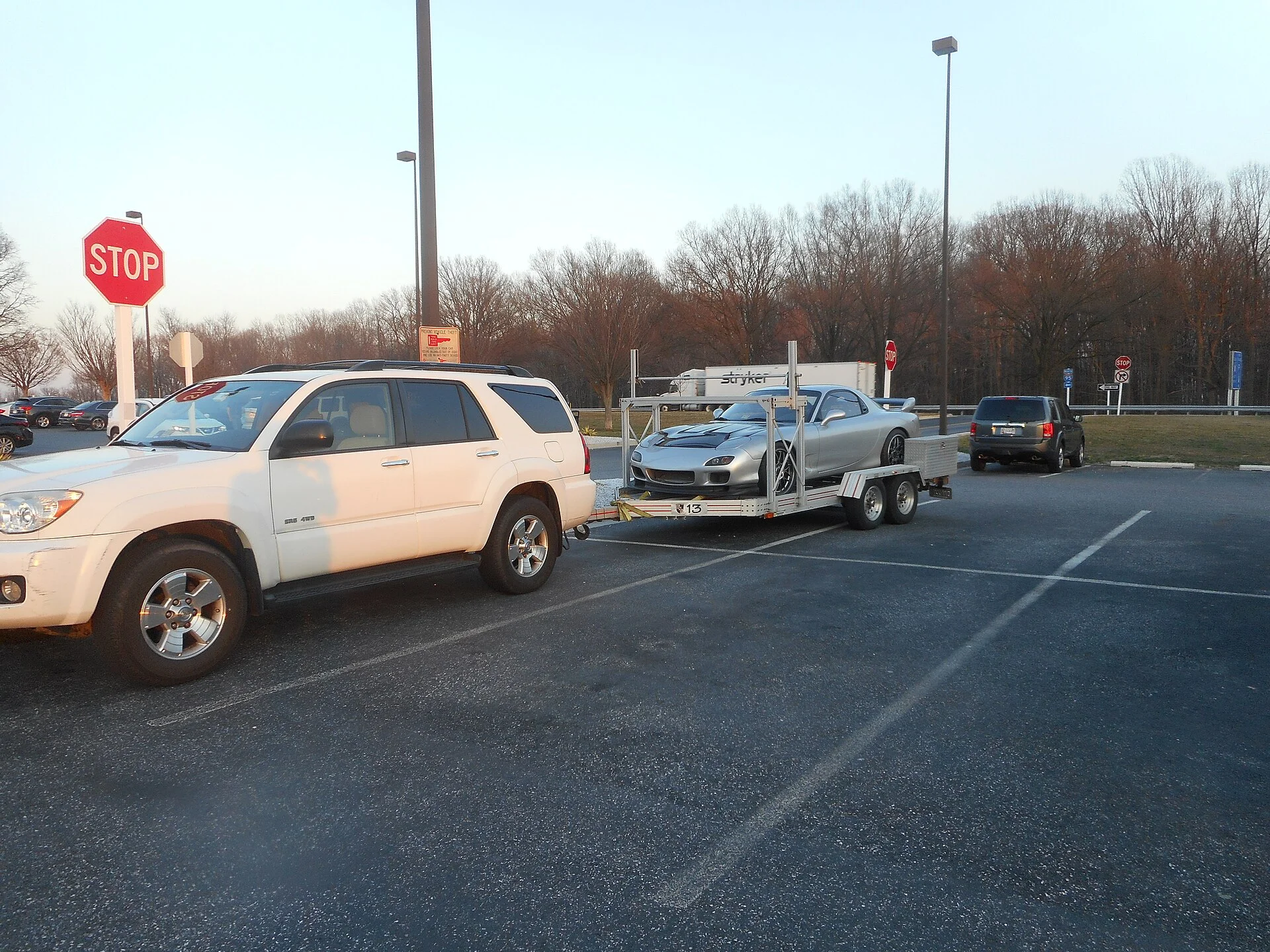 Toyota 4Runner towing a car — an earlier 4Runner generation set up to tow